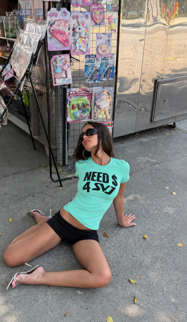 Need $ 4 SVJ teal fitted tee — seated street styling cropped around model